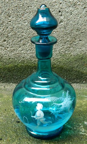 Blue decanter glass with enamel decoration