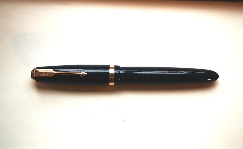 Blue Parker Duofold fountain pen.
