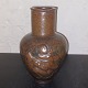 Jais Nielsen for Royal Copenhagen: Vase with potter in relief
